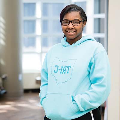 Women in Tri-C Sweatshirt on Campus