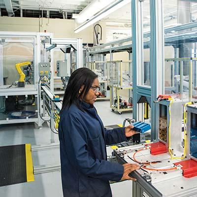 Woman working on machine